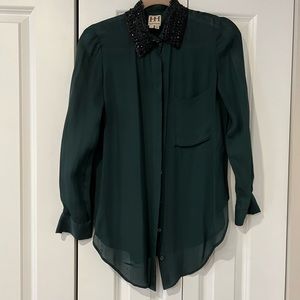 Haute Hippie long blouse
Long-Sleeve silk shirt with black beaded collar